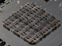 Macro view of 3nm Gate-All-Around semiconductor processor die on motherboard silicon substrate